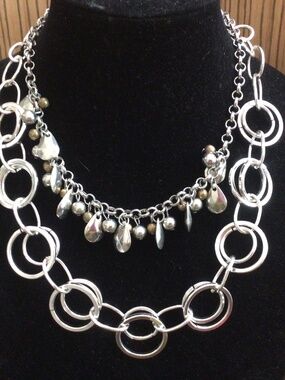 Lot of two Silvertone necklaces. Both in excellent shape.